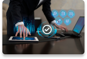 Hand interacting with tablet and laptop showing digital processes